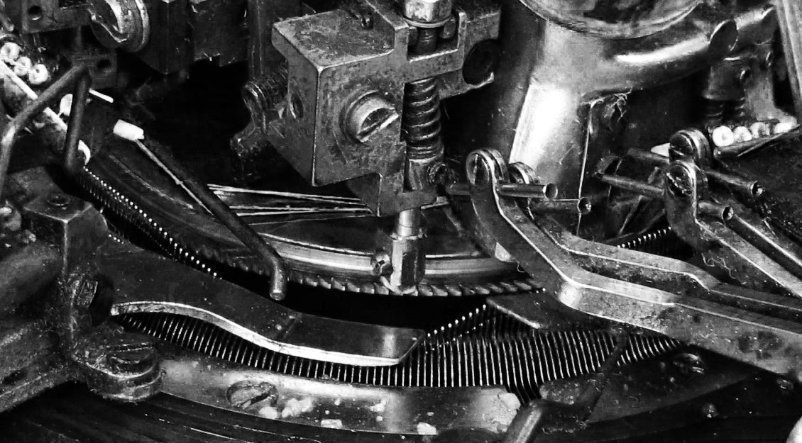 A close-up of a pantyhose knitting machine from the factory in Italy. Image taken during our visit to the factory. Photo by: Ingrid Clara Renhuldt